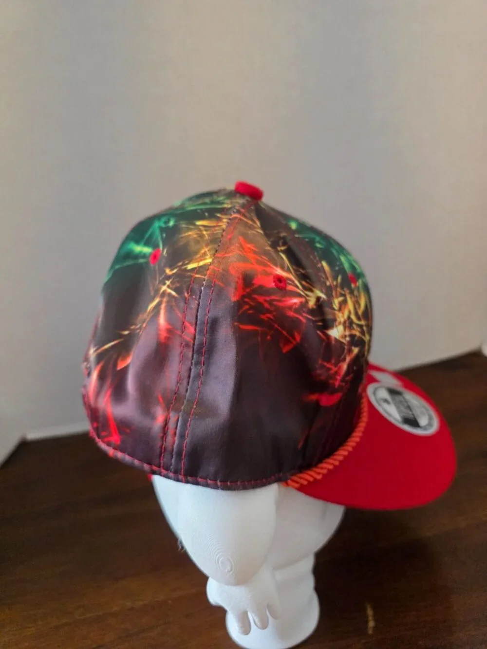 Top Cul snapback hat features a vibrant, multi-colored light